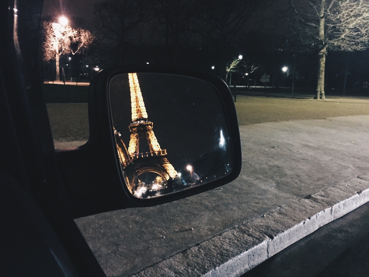 Eiffel Tower in wing mirror